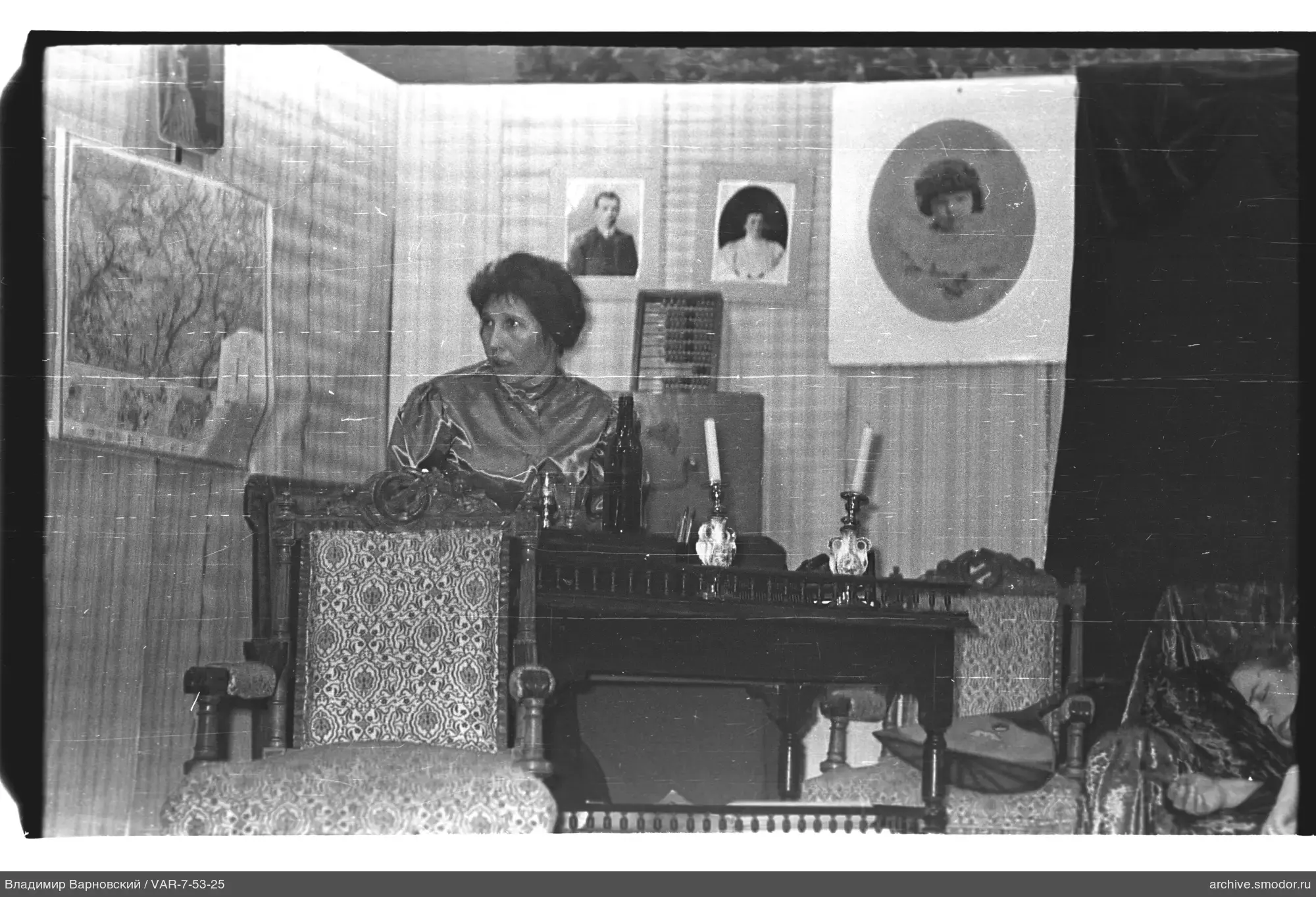 Woman sitting at a table in a room