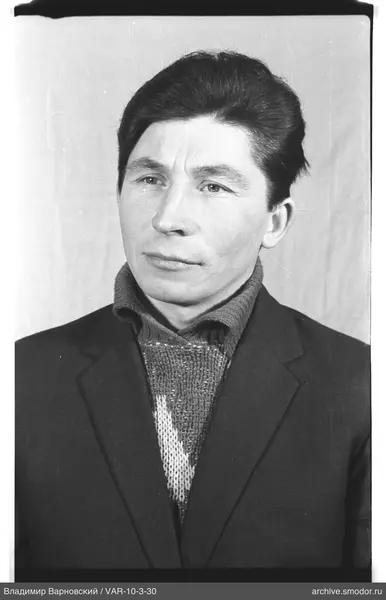 Portrait of a man in dark clothing