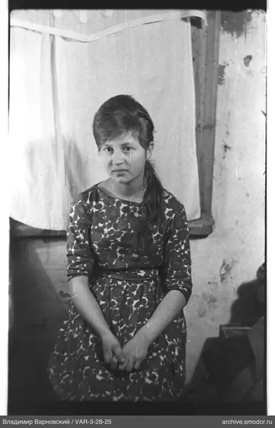 Portrait of a woman in a patterned dress