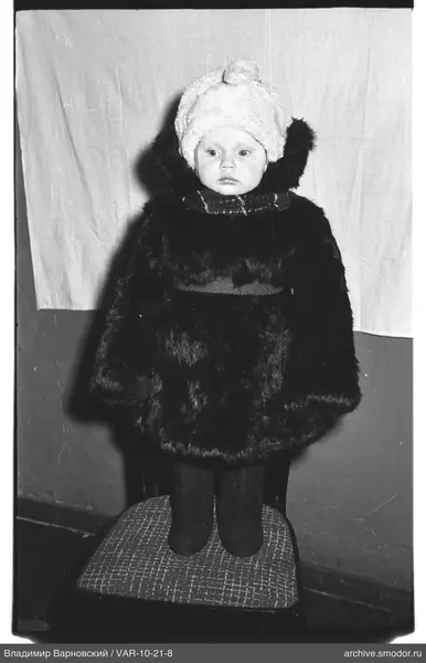 Child portrait in fur coat