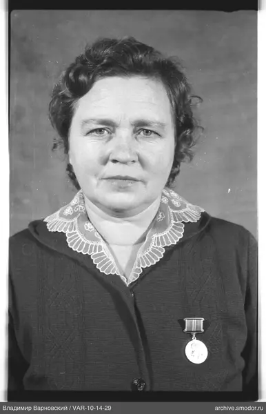 Bust portrait of a woman with a medal