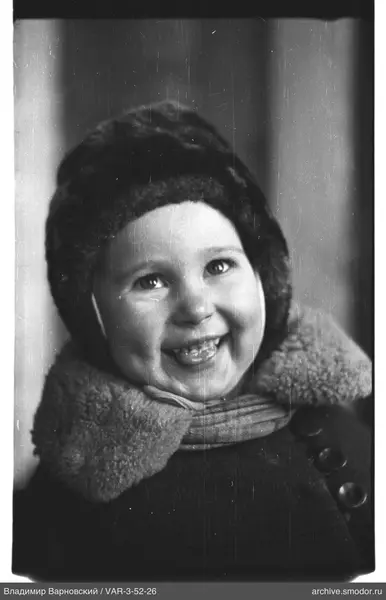 Child's portrait in fur hat and coat