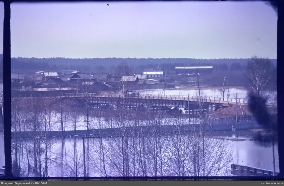 Wooden bridge and village
