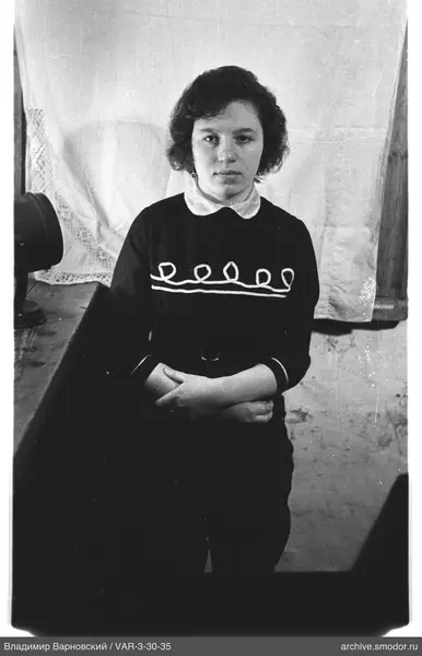 Portrait of a woman in a dark sweater