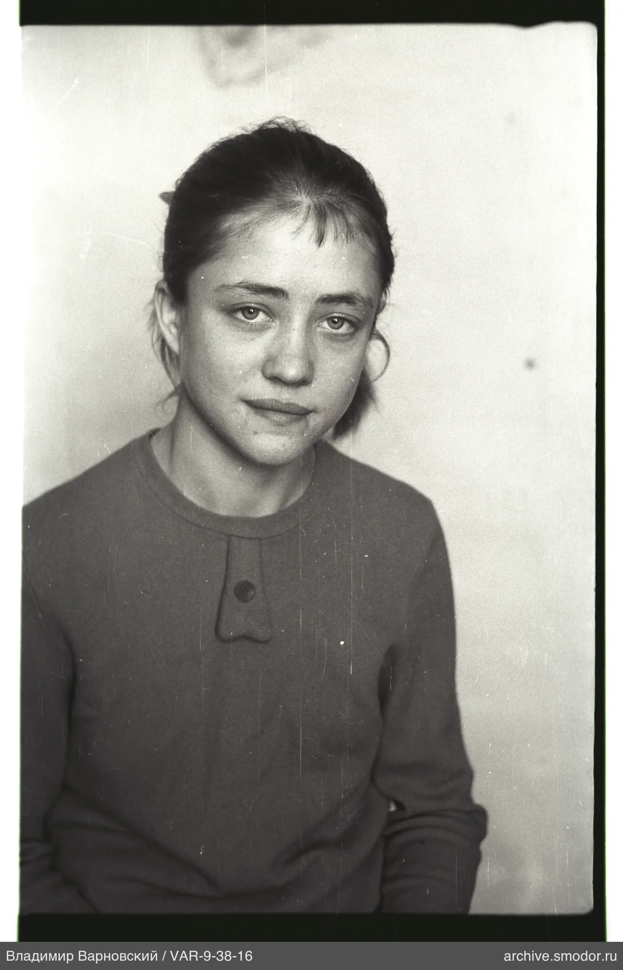 Portrait of a woman in a dark sweater