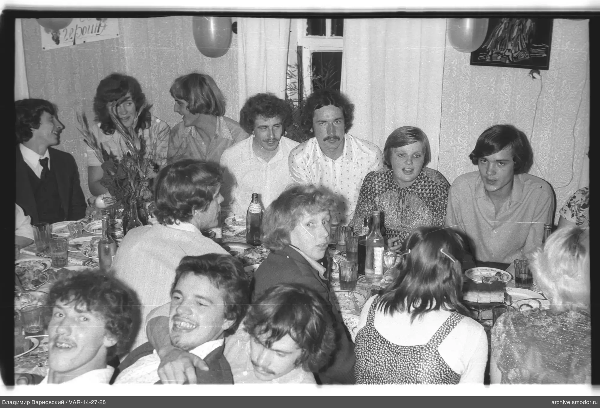 Young people at a table during an event