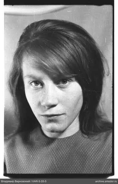 Portrait of a woman in a dark sweater