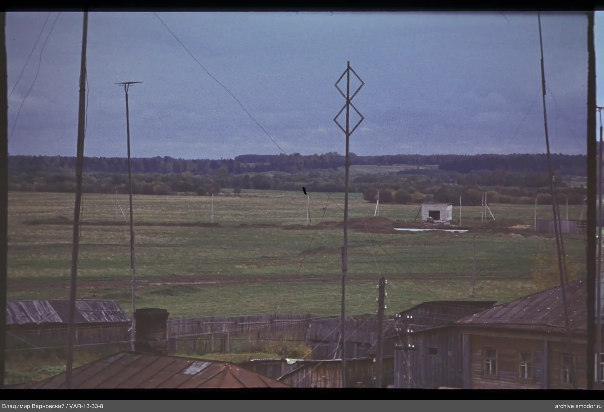 Wooden houses and electric poles
