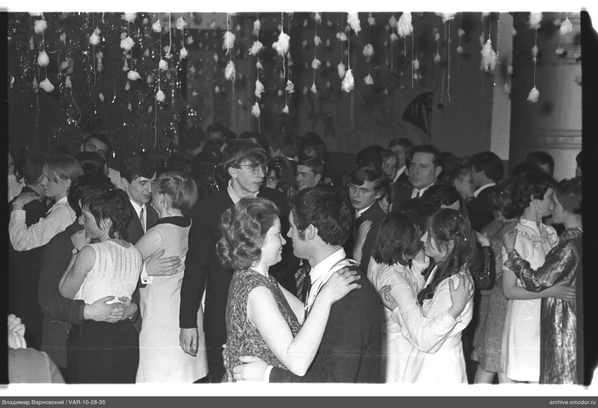 Couples dancing indoors
