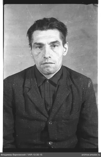 Portrait of a man in dark clothing