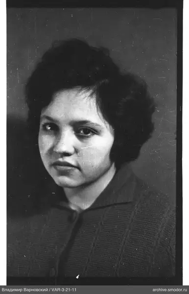 Portrait of a woman with short dark hair