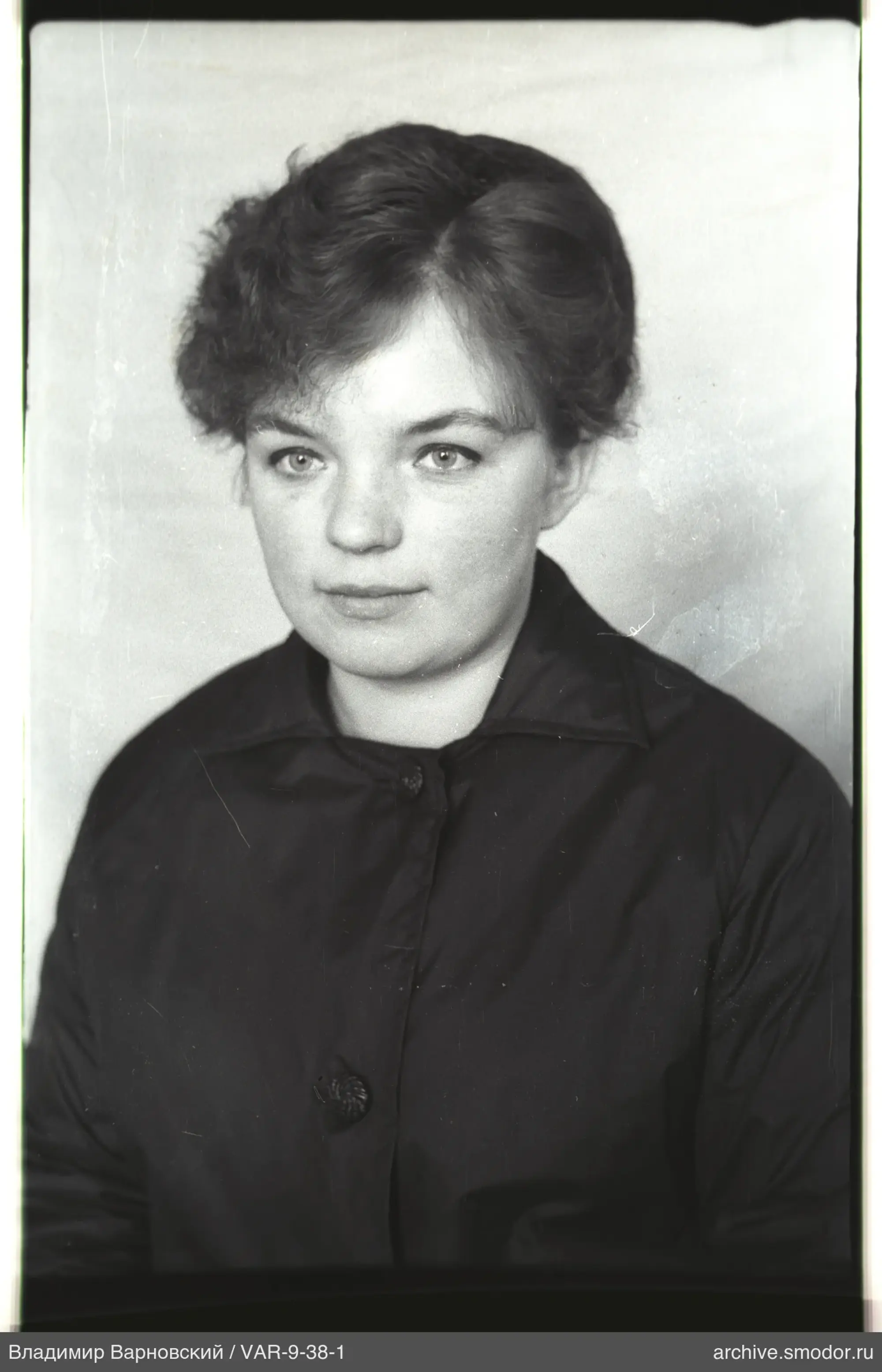 Portrait of a woman with short wavy hair
