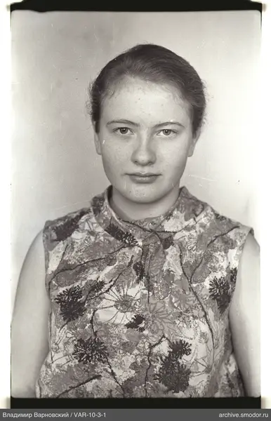 Portrait of a woman in a floral blouse