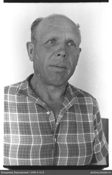 Portrait of a man with short light hair