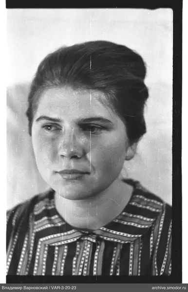 Portrait of a woman in a striped dress