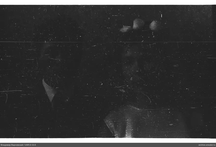 Portrait of a man and woman in dark clothing