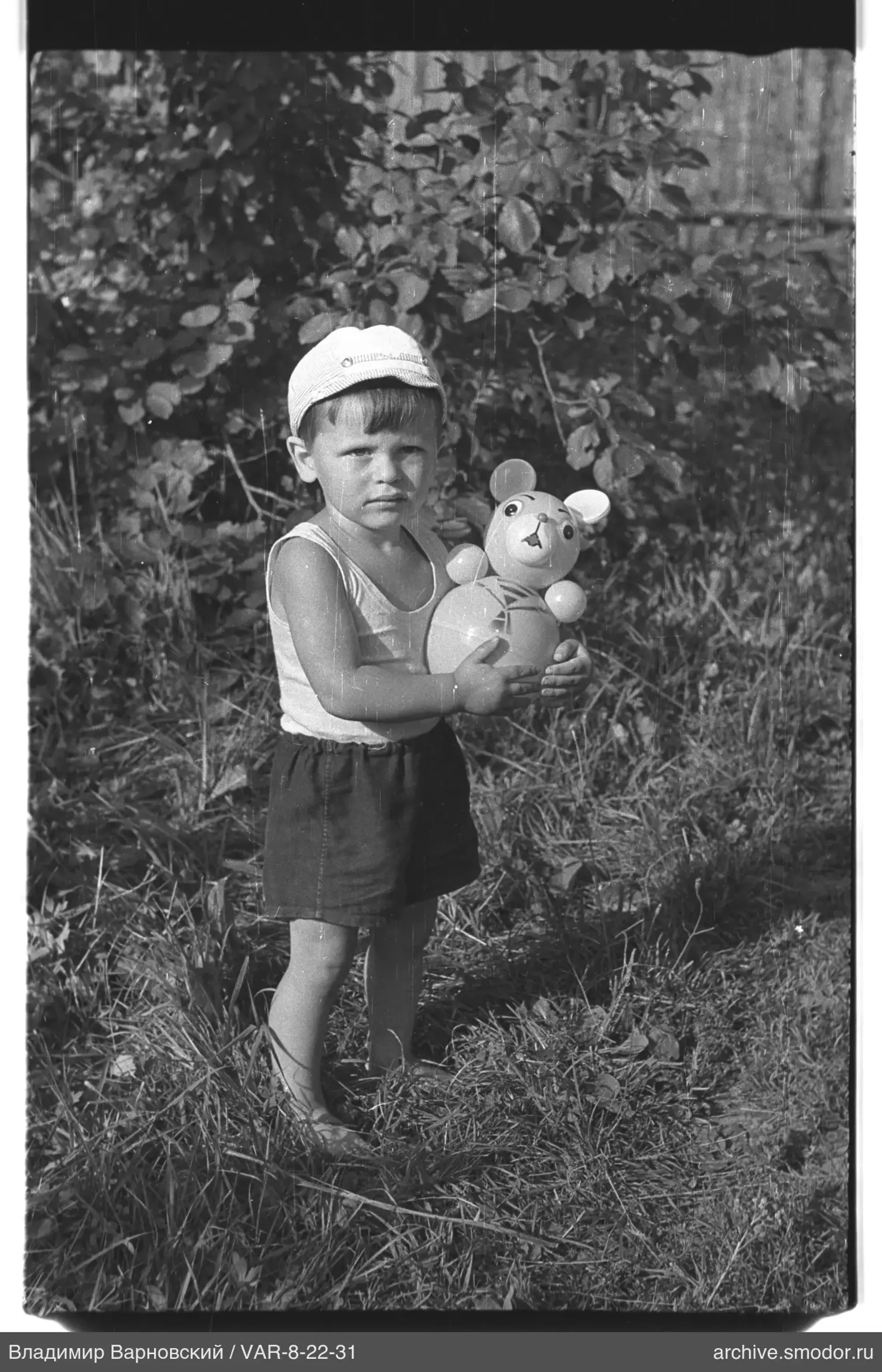 Child with teddy bear toy