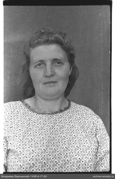 Portrait of a woman in a light blouse