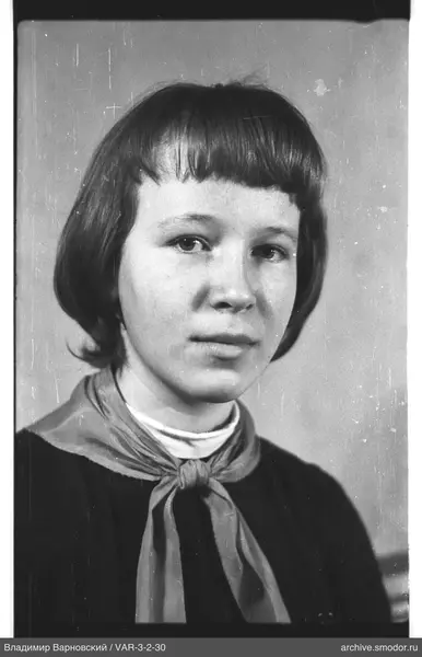 Bust portrait of a girl with short hair