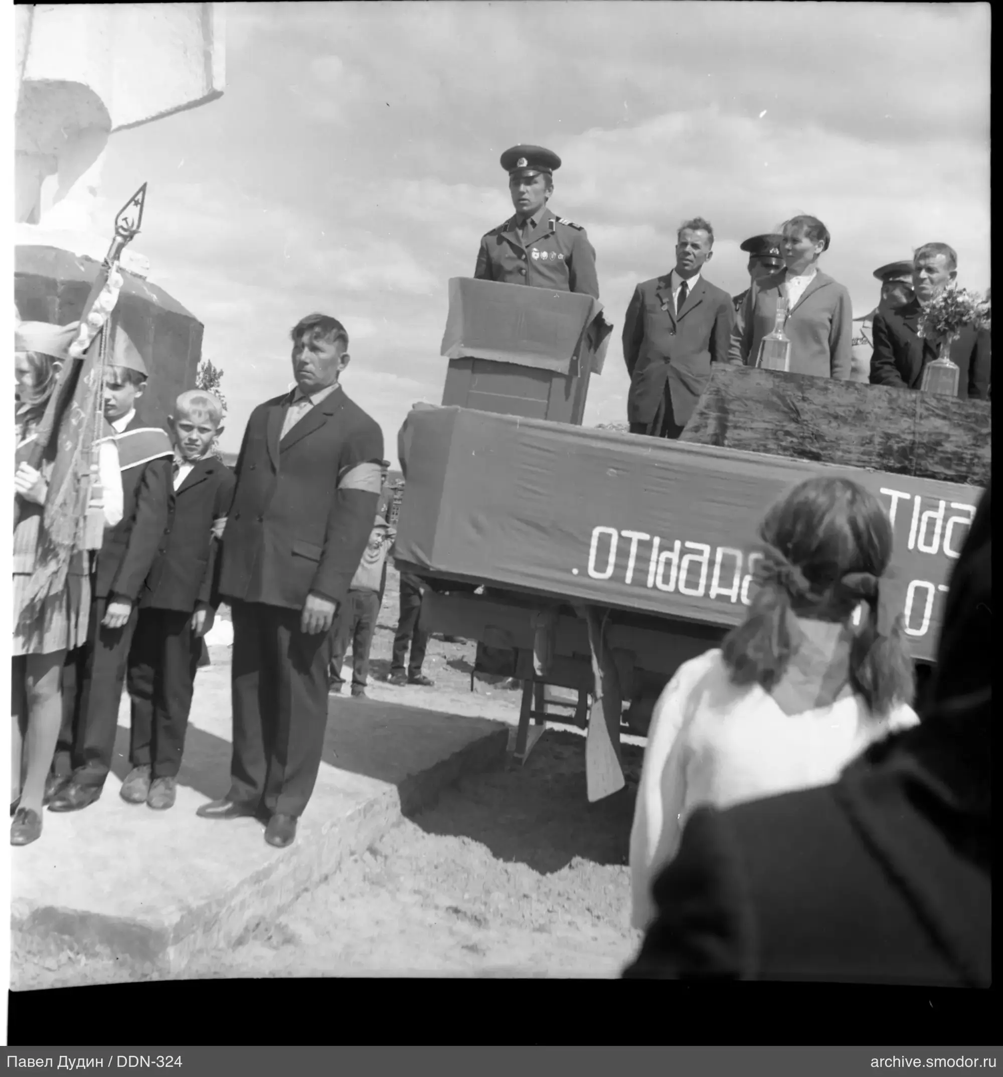 Man in military uniform at podium