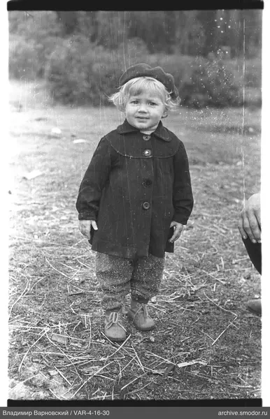 Child portrait in dark coat and beret