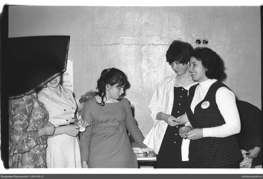 Group portrait of women by the wall