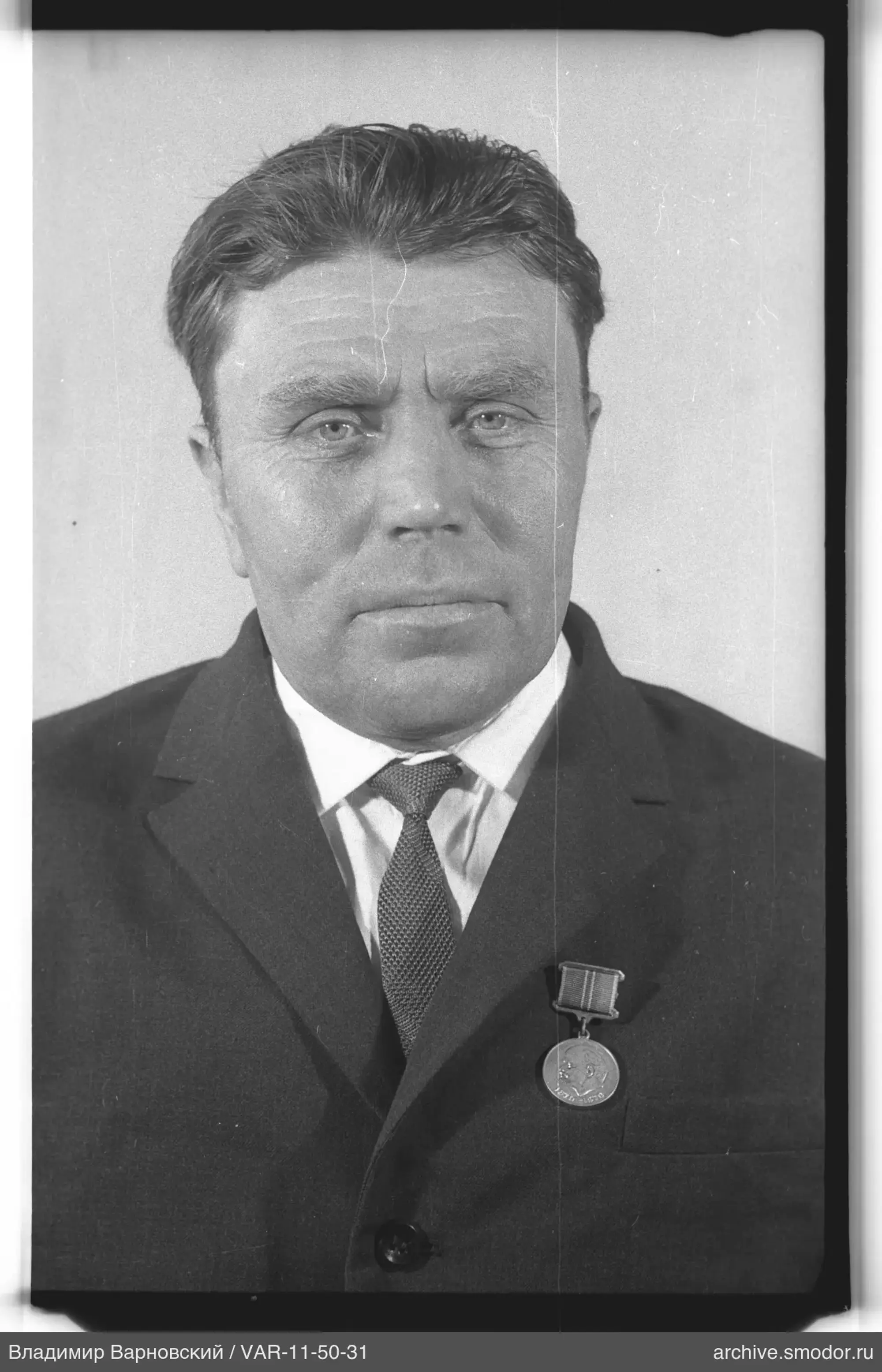 Портрет мужчины с медалью