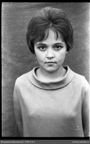 Bust portrait of a girl with short hair