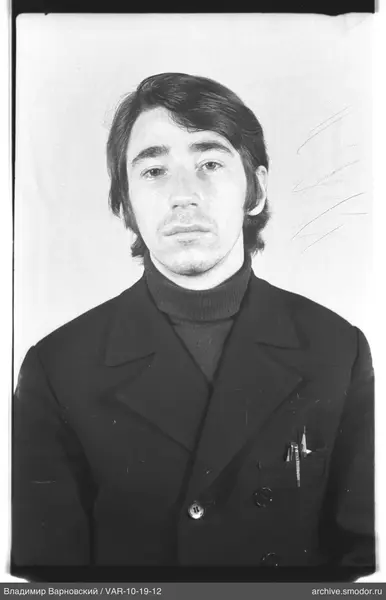 Portrait of a man in a dark jacket
