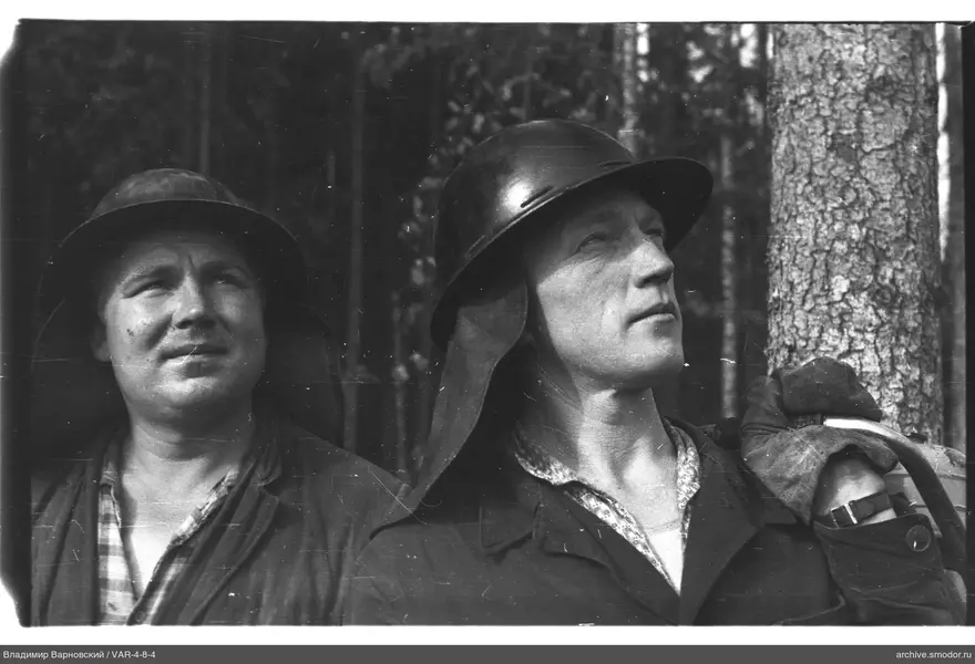 Portrait of two men in work clothes
