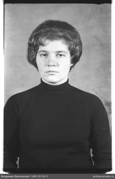 Portrait of a woman in a dark sweater