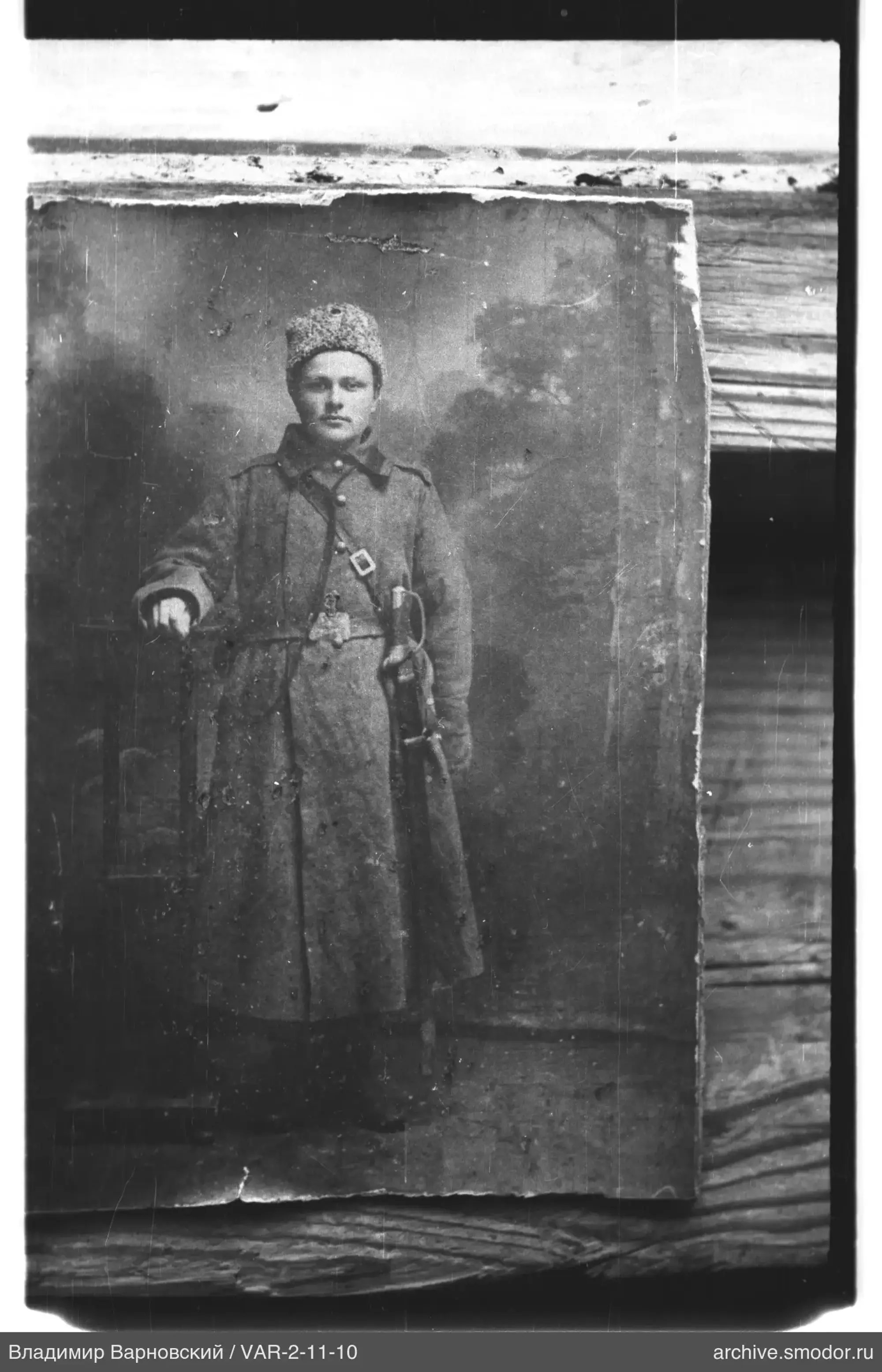 Man in military coat and fur hat