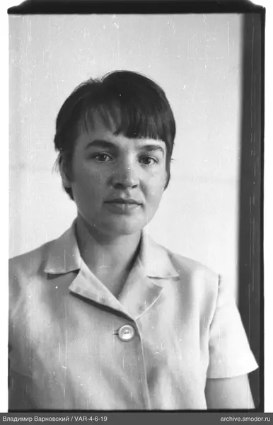 Portrait of a woman in a light shirt