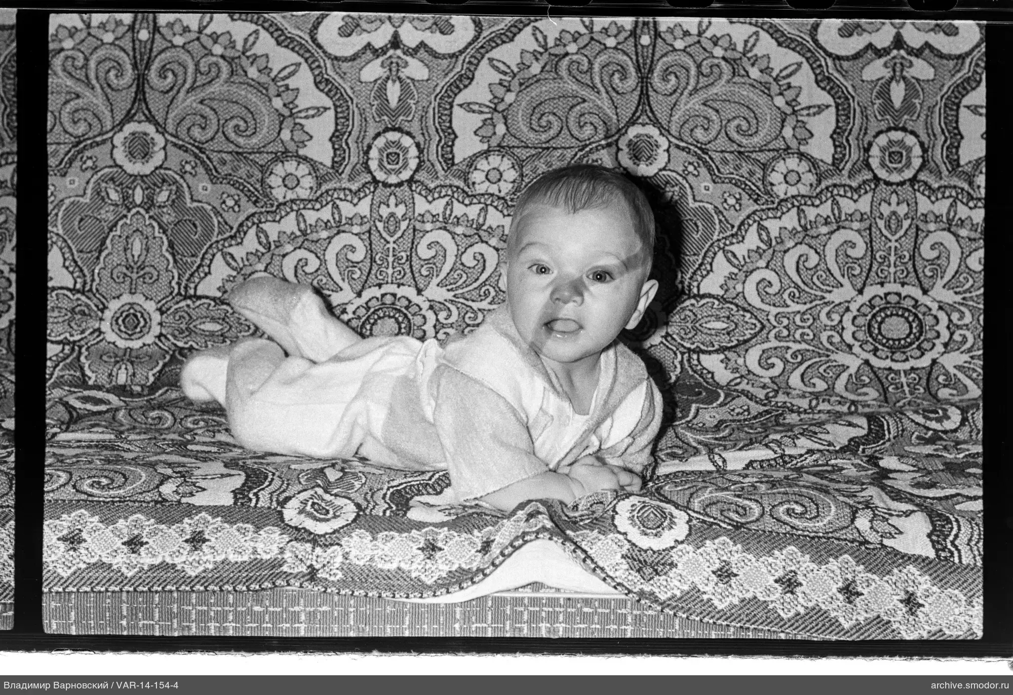 Child lying on a sofa