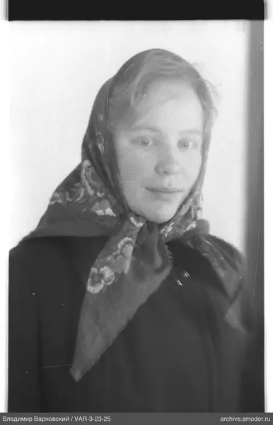 Portrait of a woman with a headscarf