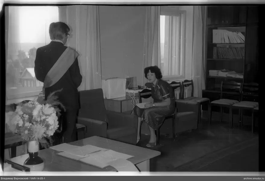 Man and woman in room