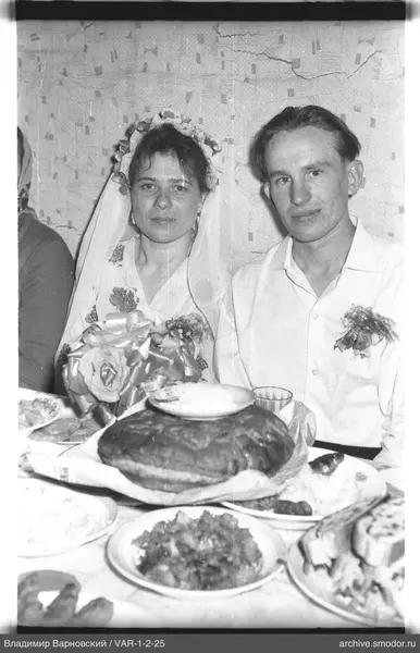 Groom and Bride at the Festive Table