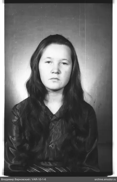 Portrait of a woman with long dark hair