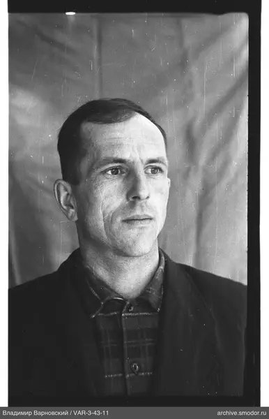 Portrait of a man in dark clothing