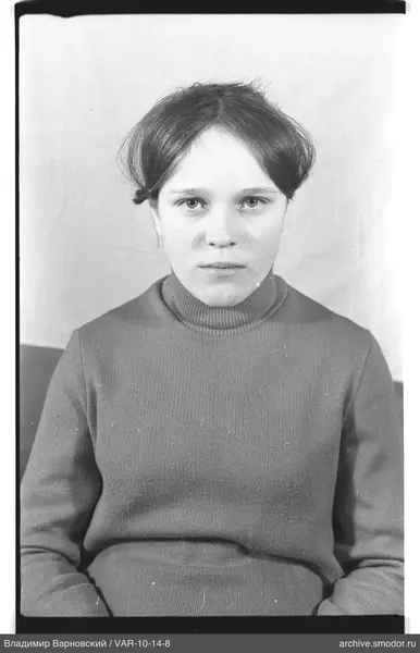 Portrait of a woman in a light sweater