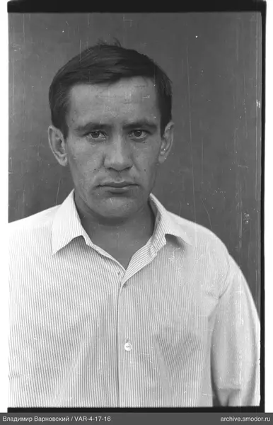 Portrait of a man in a light shirt