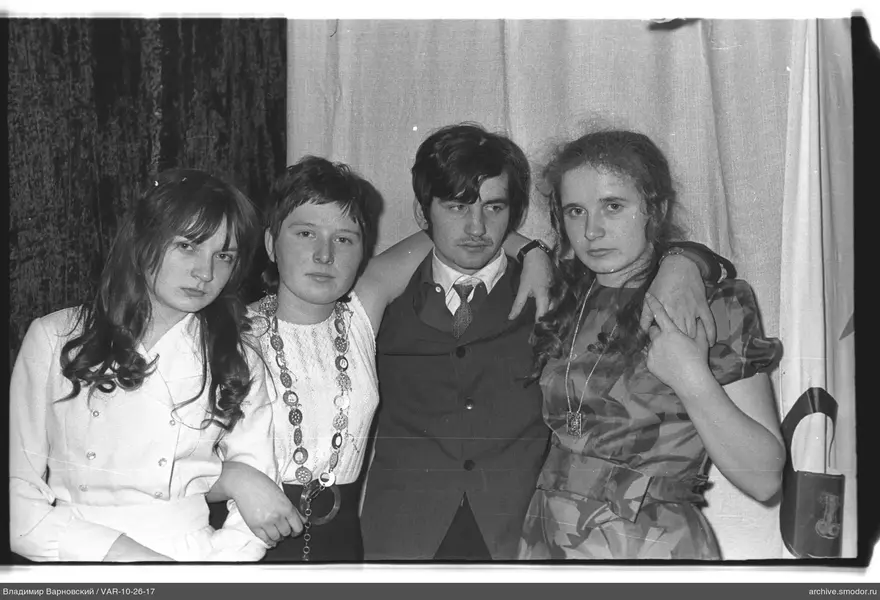 Group portrait of four people