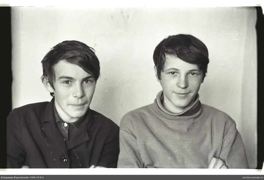 Two young men in group portrait
