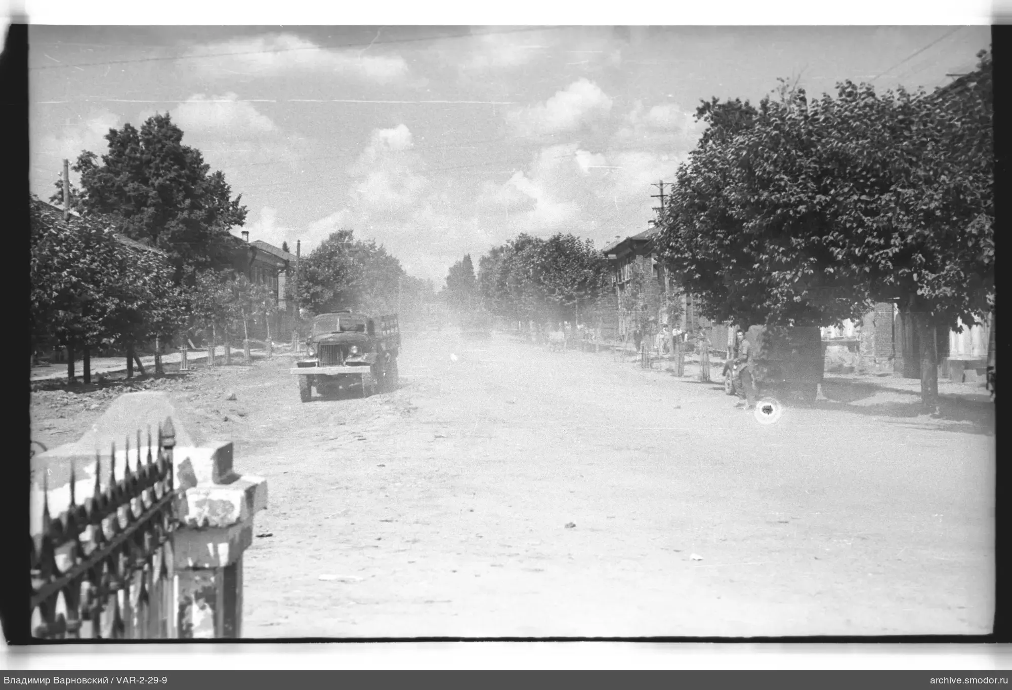 Wide street with truck and person