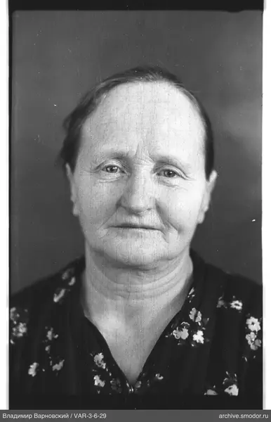 Portrait of a woman in dark clothing