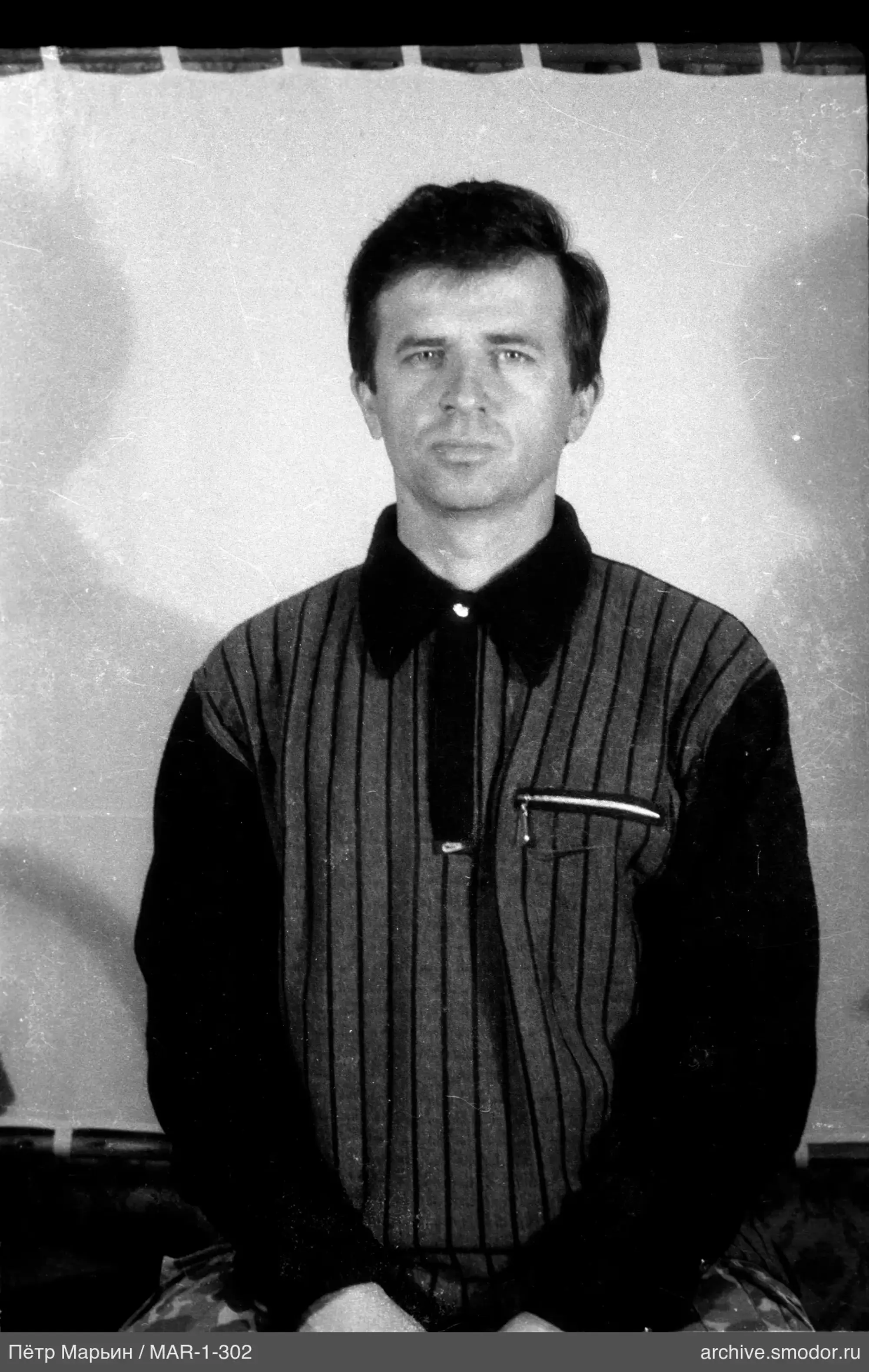 Портрет мужчины в полосатом рубашке