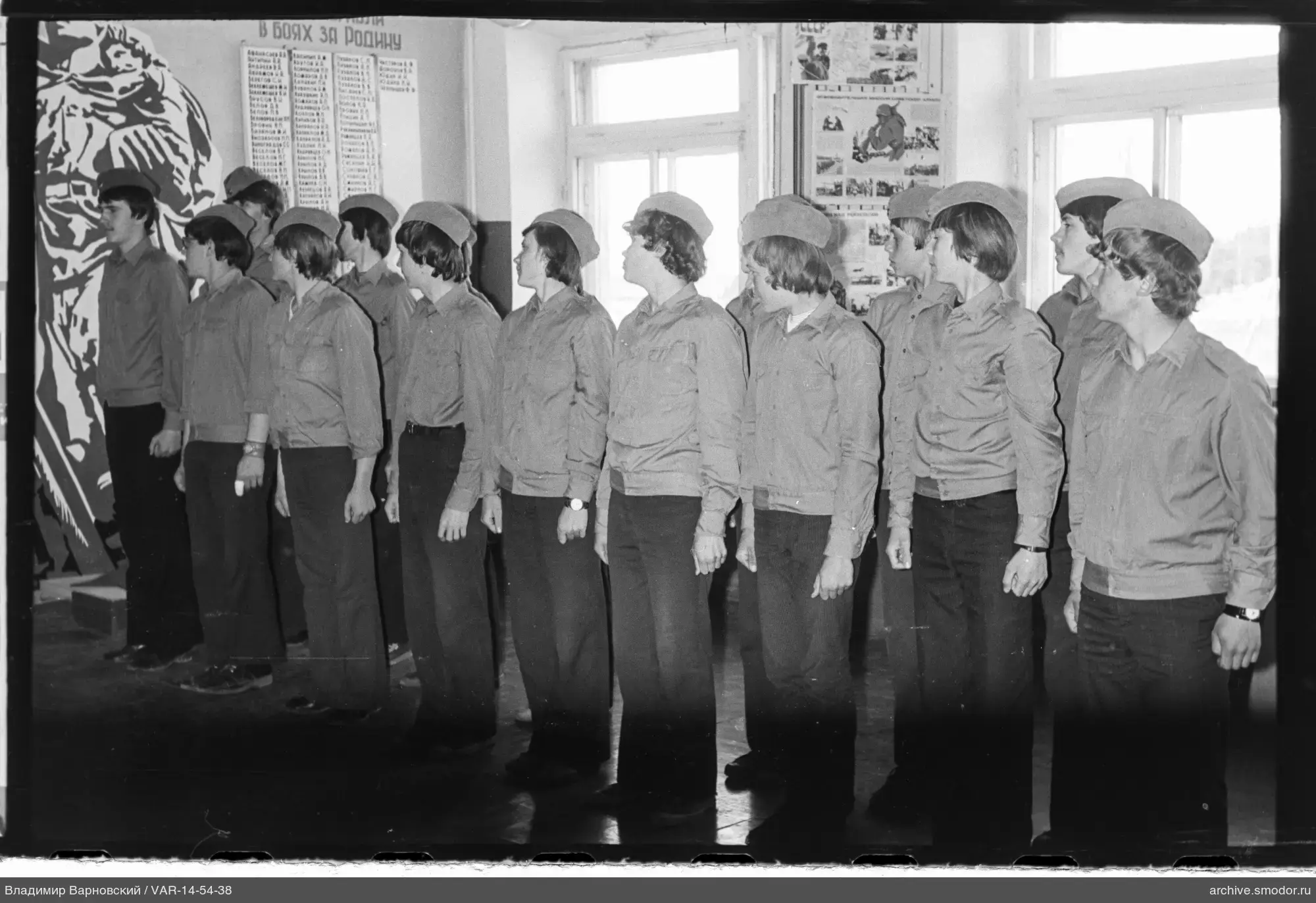 Group of young people in caps