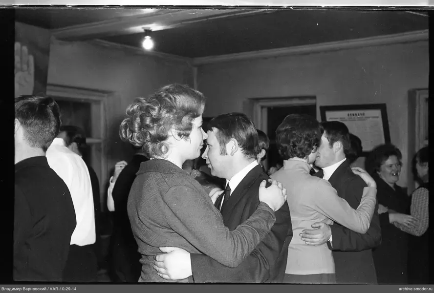 Dancing couples at an event