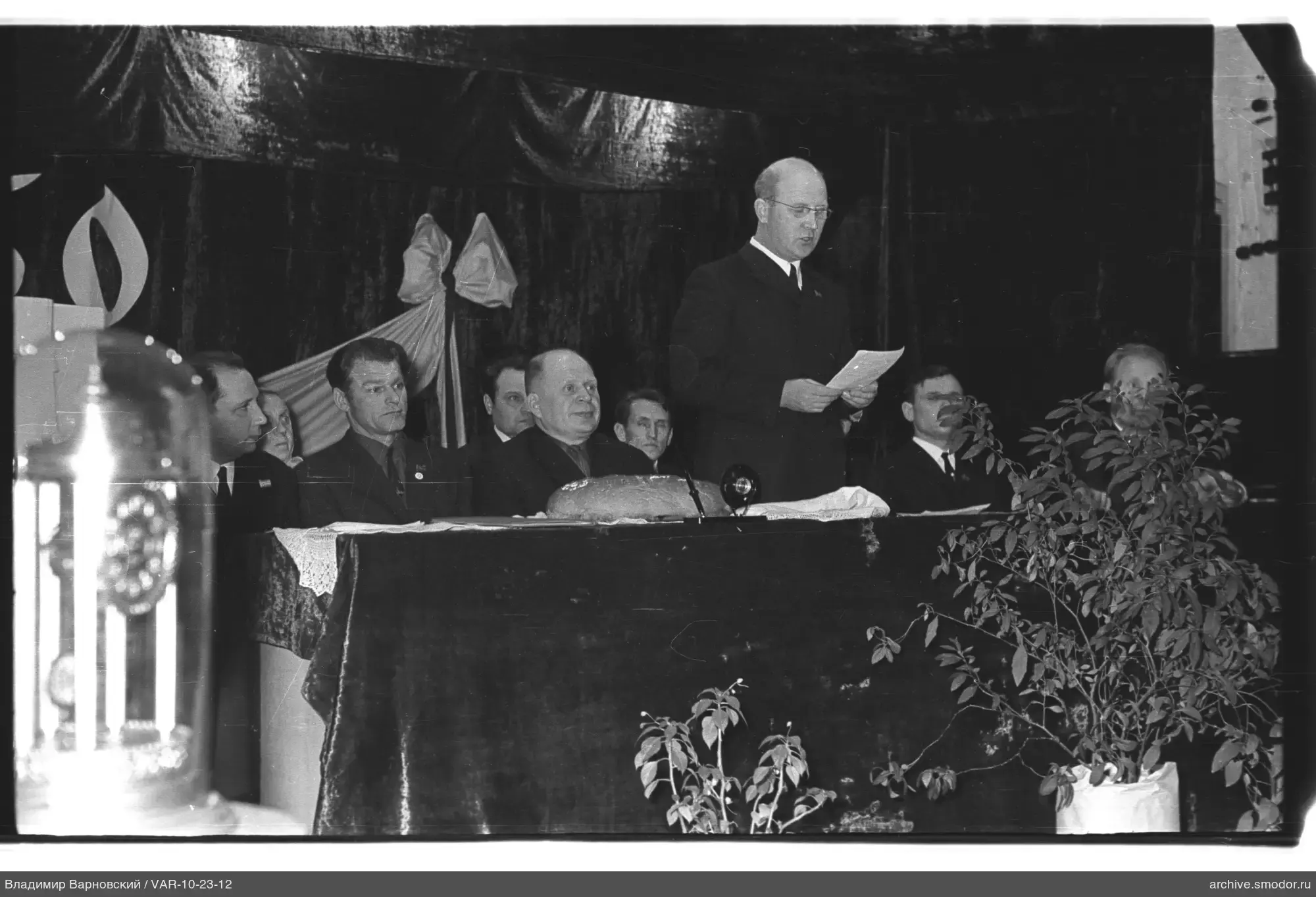 Men at a table during an event