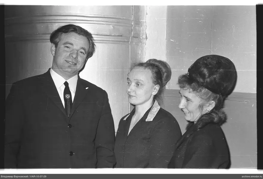 Group portrait of three adults